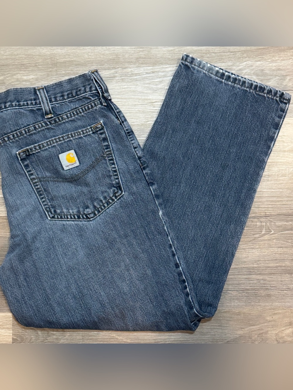Carhartt Men's Straight Blue Denim Jeans Relaxed Fit with Back Pocket Logo